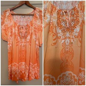 Beautiful light weight, short sleeve blouse